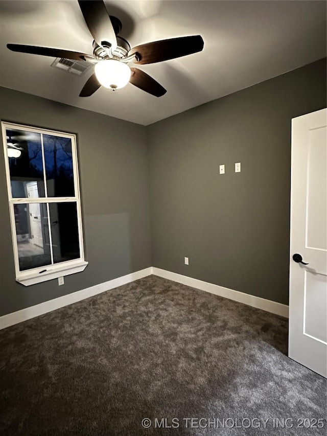 carpeted empty room with ceiling fan