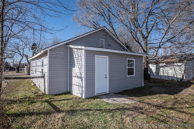 view of outdoor structure with a yard