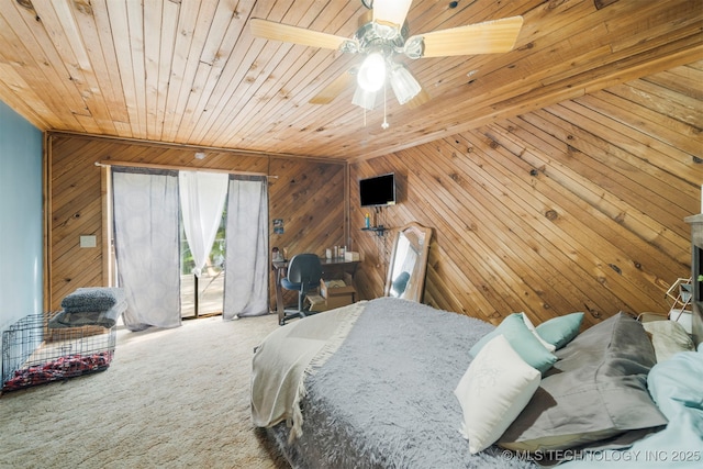 bedroom with wood walls, wooden ceiling, access to outside, ceiling fan, and carpet floors