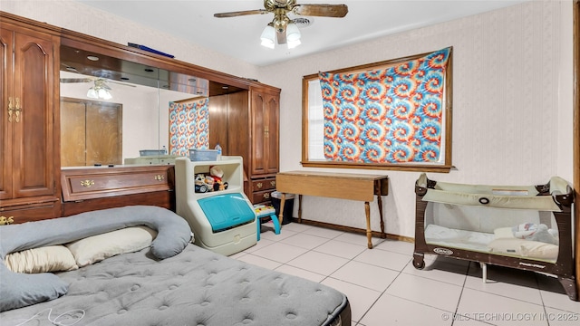 tiled bedroom with ceiling fan