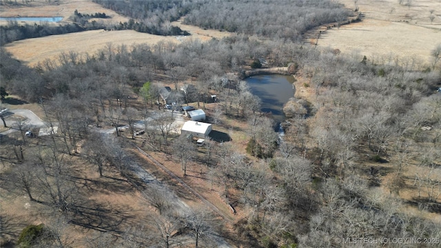 drone / aerial view featuring a rural view and a water view