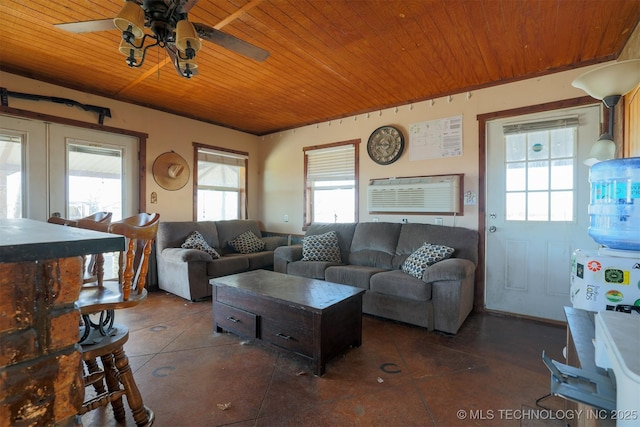 living room featuring wooden ceiling, a wealth of natural light, ceiling fan, and dark tile patterned flooring