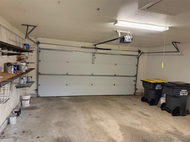 garage featuring a garage door opener