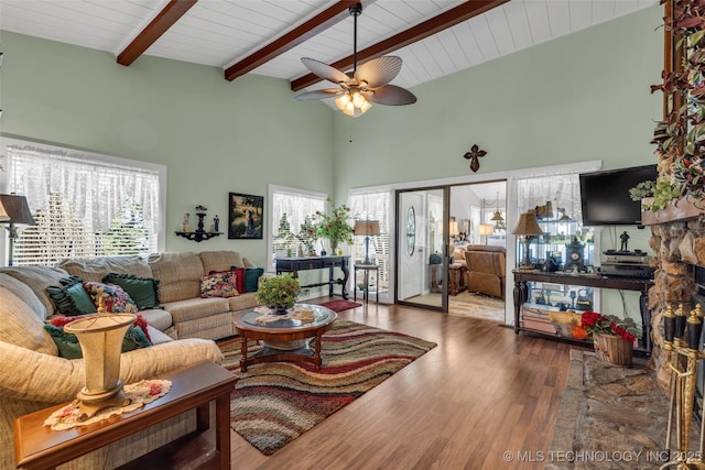 living room with wood ceiling, ceiling fan, wood-type flooring, high vaulted ceiling, and beamed ceiling