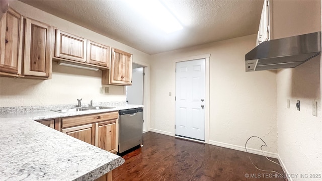 kitchen with a textured ceiling, sink, light brown cabinets, dishwasher, and dark hardwood / wood-style floors