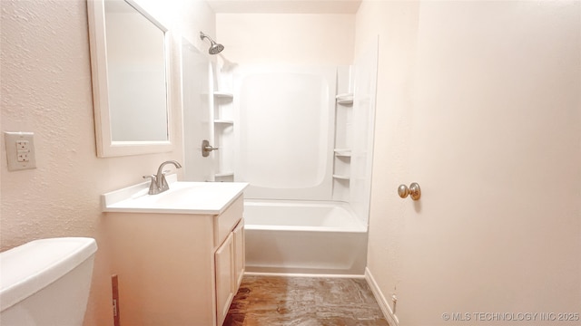 full bathroom with vanity, toilet, and bathtub / shower combination