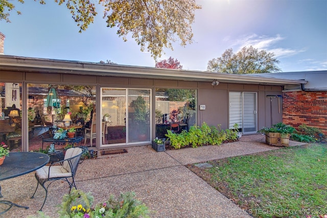 back of property with a patio area