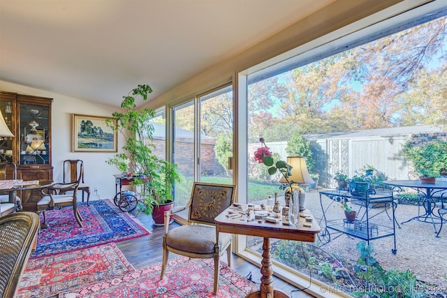 sunroom / solarium with lofted ceiling