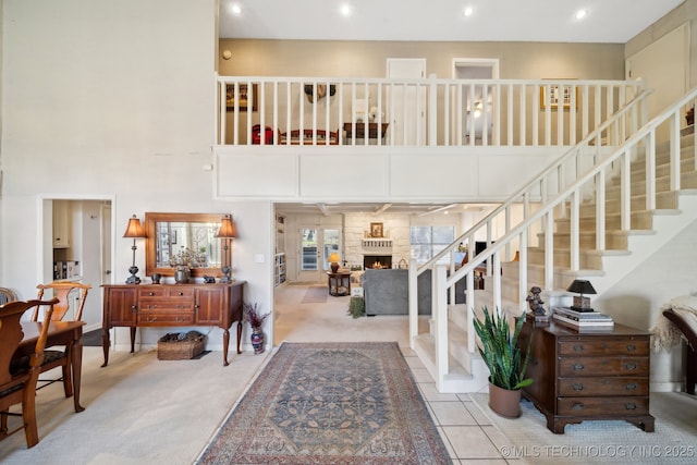 entryway featuring light colored carpet