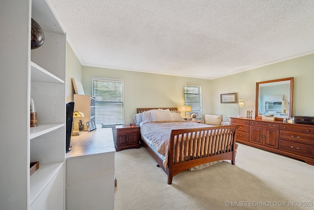 carpeted bedroom featuring a textured ceiling and ornamental molding