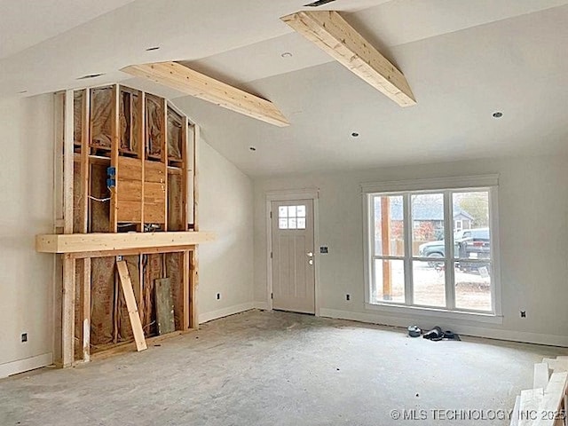 interior space featuring vaulted ceiling