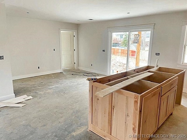 kitchen with light brown cabinets