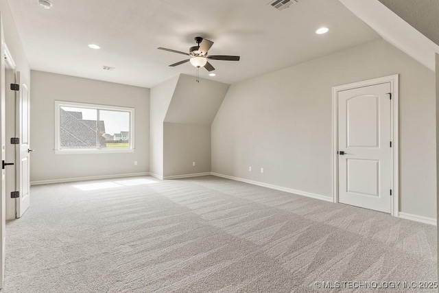 bonus room featuring light colored carpet, ceiling fan, and lofted ceiling