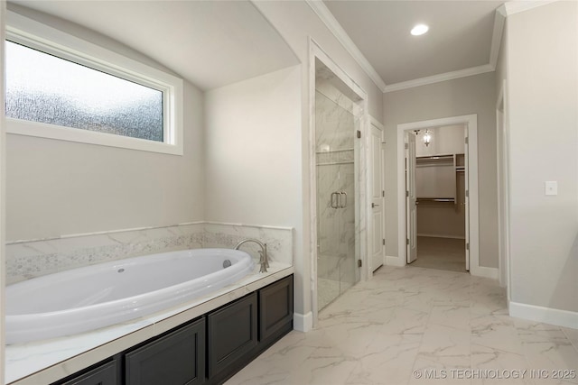 bathroom with separate shower and tub and ornamental molding