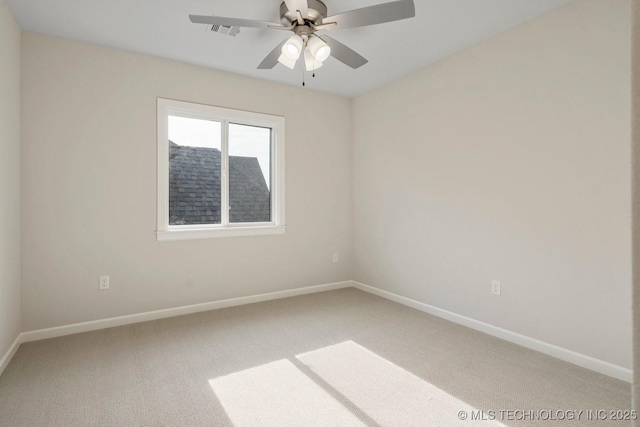 unfurnished room with carpet flooring and ceiling fan