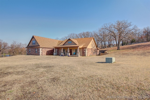 view of front of home with a front yard