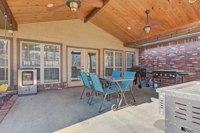 view of patio / terrace featuring heating unit, a grill, and ceiling fan