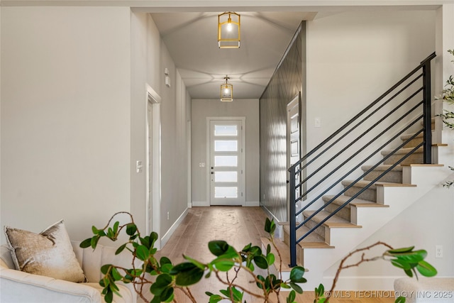 entrance foyer featuring hardwood / wood-style floors