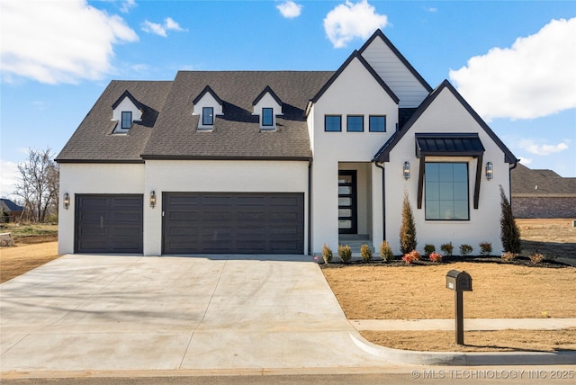 view of front of home with a garage