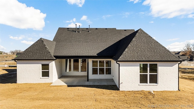 rear view of house featuring a patio area