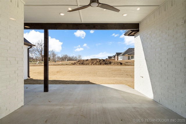 view of patio with ceiling fan