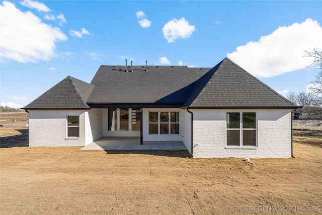 rear view of property with a patio area