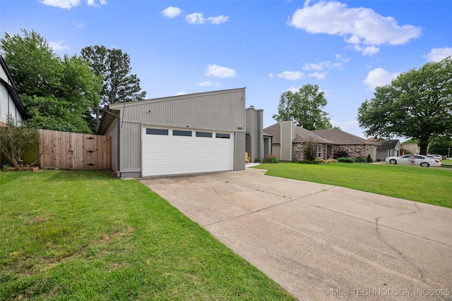 view of front of house featuring a garage and a front yard