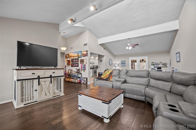 living room featuring a textured ceiling, lofted ceiling with beams, dark hardwood / wood-style floors, and ceiling fan