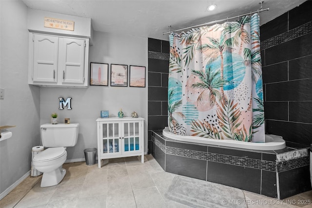 bathroom featuring tile patterned flooring, shower / tub combo, and toilet