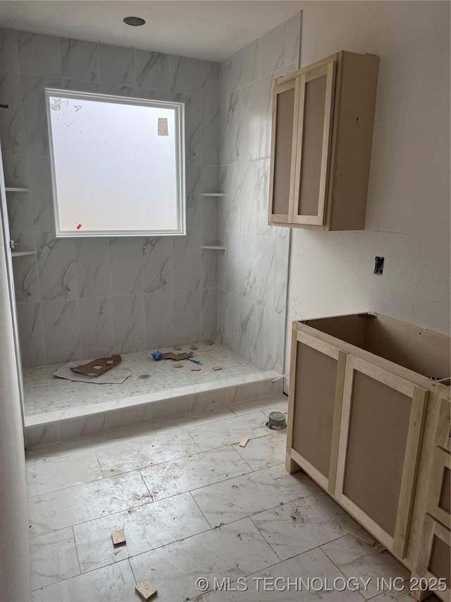 bathroom with a shower