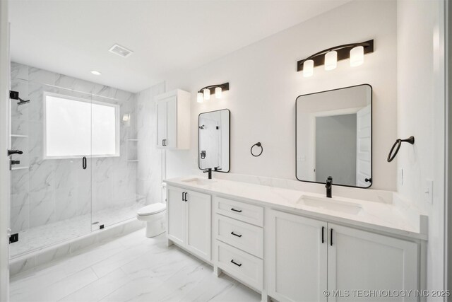 404 W 7th St, Dewey, OK 74029 - full bath featuring a marble finish shower, toilet, double vanity, marble finish floor, and a sink
