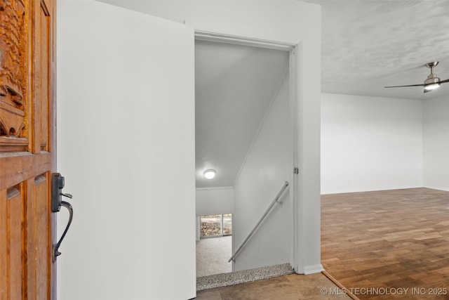 corridor featuring wood-type flooring