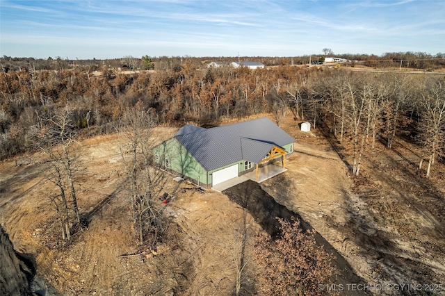 birds eye view of property featuring a rural view