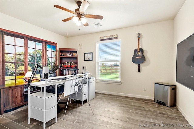 office space featuring ceiling fan and wood-type flooring