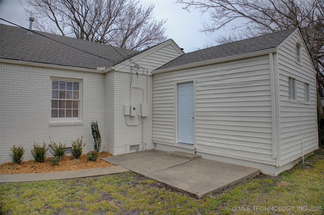 property entrance featuring a patio