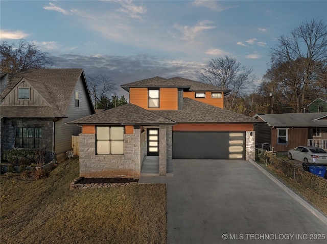 514 W Dallas St, Broken Arrow, OK 74012 - view of front of house with an attached garage, asphalt driveway, roof with shingles, and stone siding