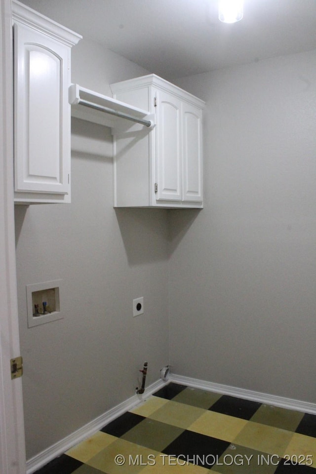 clothes washing area with electric dryer hookup, hookup for a gas dryer, cabinets, and washer hookup