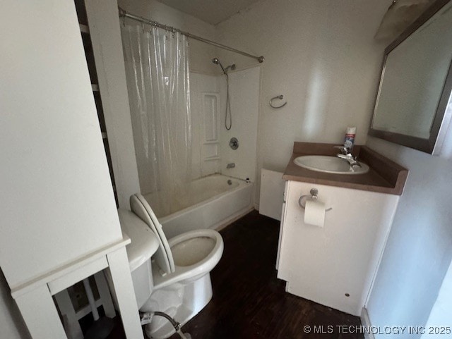 full bathroom featuring vanity, toilet, and shower / bath combo with shower curtain