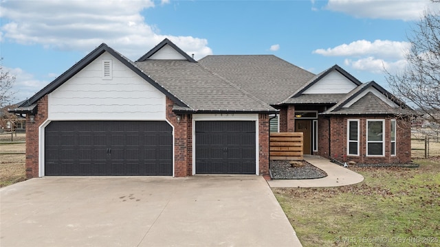 view of front of home with a garage