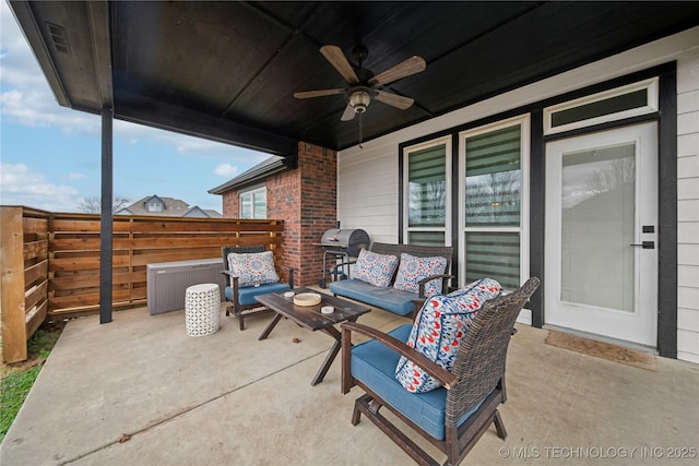 view of patio / terrace featuring an outdoor living space, ceiling fan, and a grill