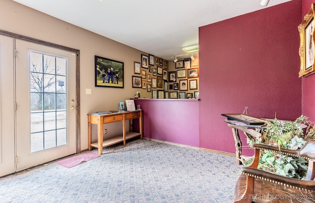 entryway featuring carpet