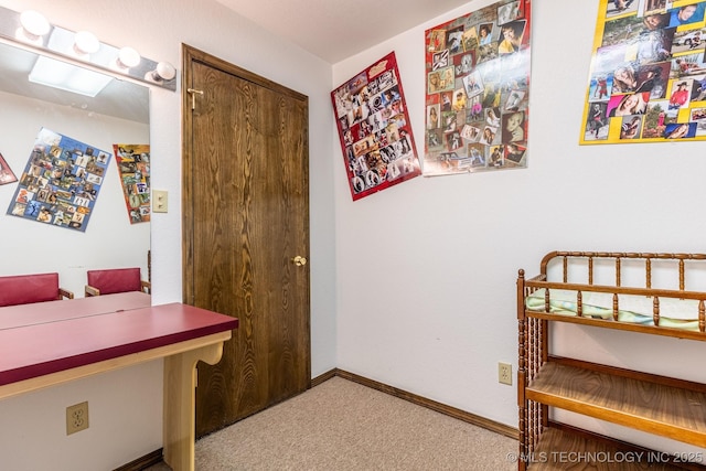 hallway featuring carpet floors