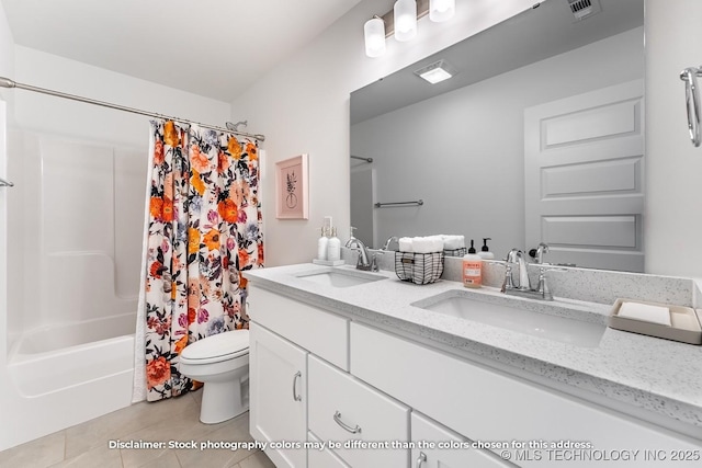 full bath with double vanity, a sink, visible vents, and tile patterned floors