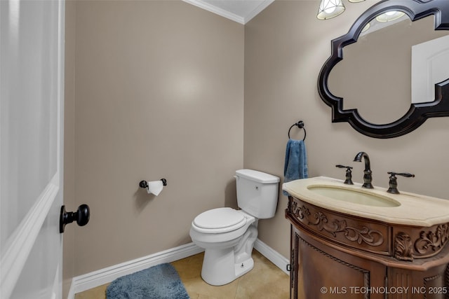 bathroom featuring toilet, tile patterned flooring, vanity, and ornamental molding