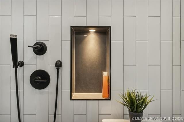 interior details featuring walk in shower