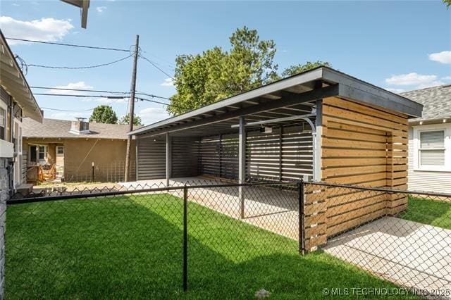 view of outbuilding featuring a yard