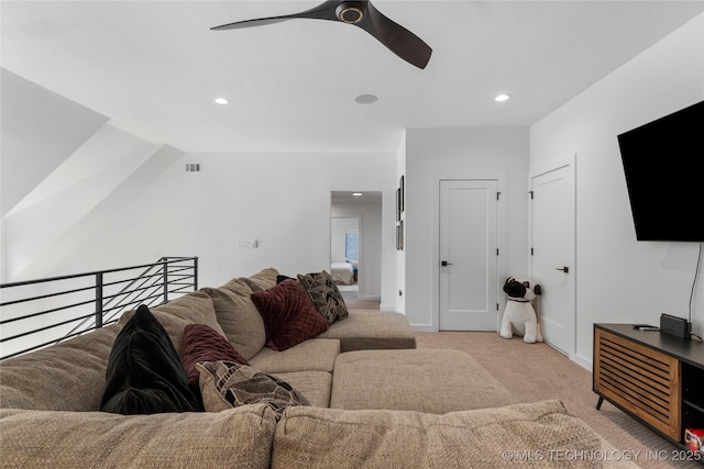 living area with baseboards, visible vents, a ceiling fan, light colored carpet, and recessed lighting