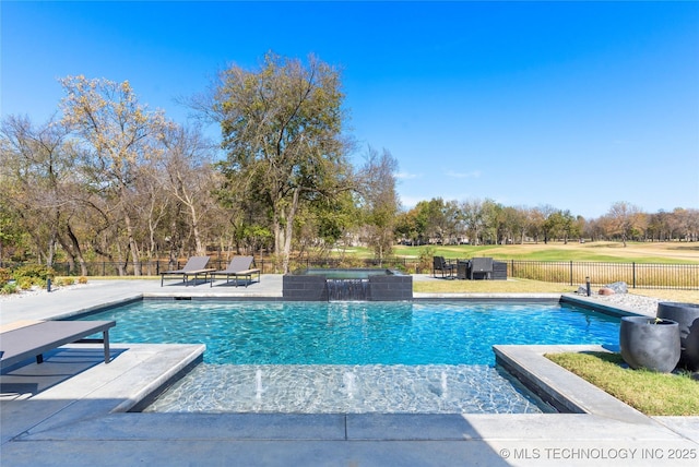 view of pool with pool water feature and a patio