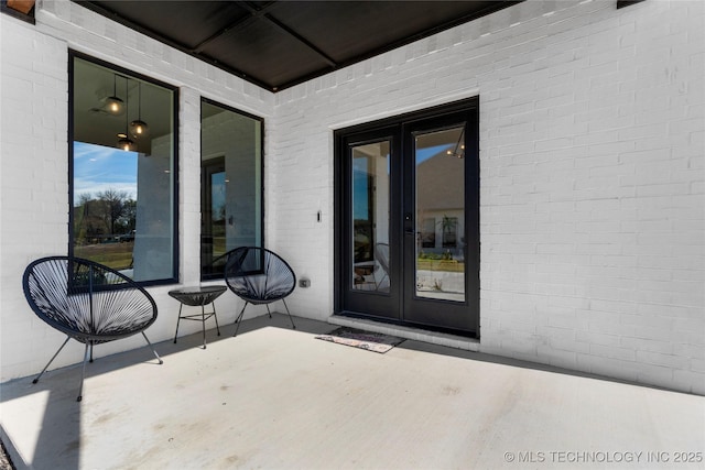 view of patio featuring french doors