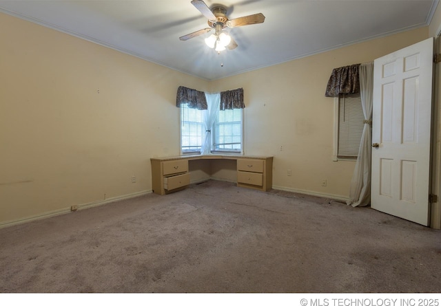 unfurnished bedroom with light colored carpet, ceiling fan, and ornamental molding